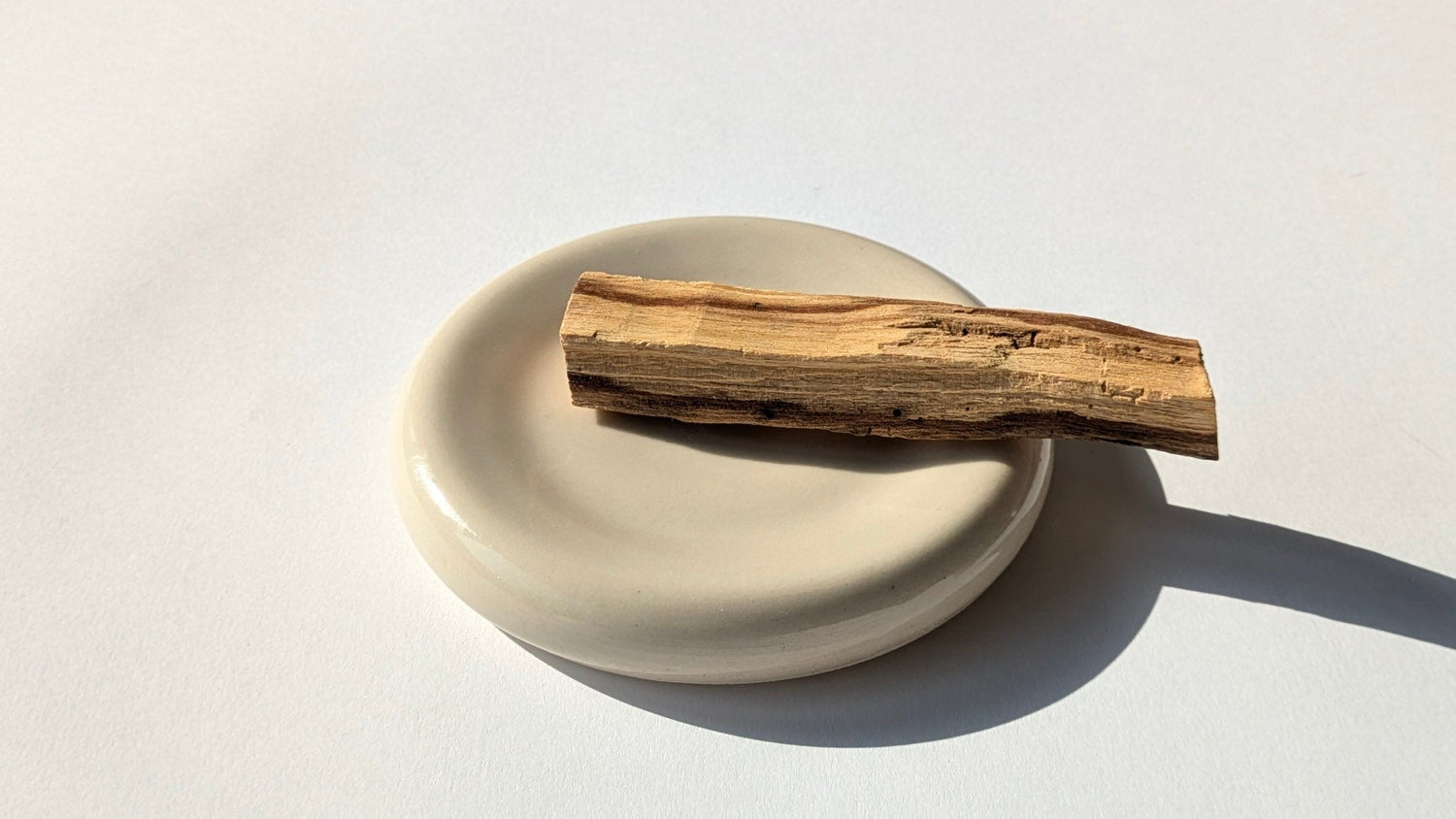 palo santo on ceramic dish handmade